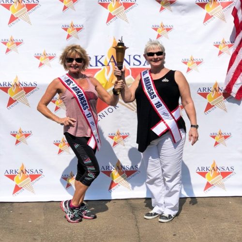 Ms. Arkansas Senior America 2017 Sherry Marshall and Ms. Arkansas Senior America 2018 Dixie Makepeace Ford opening the 2018 Arkansas Senior Olympics